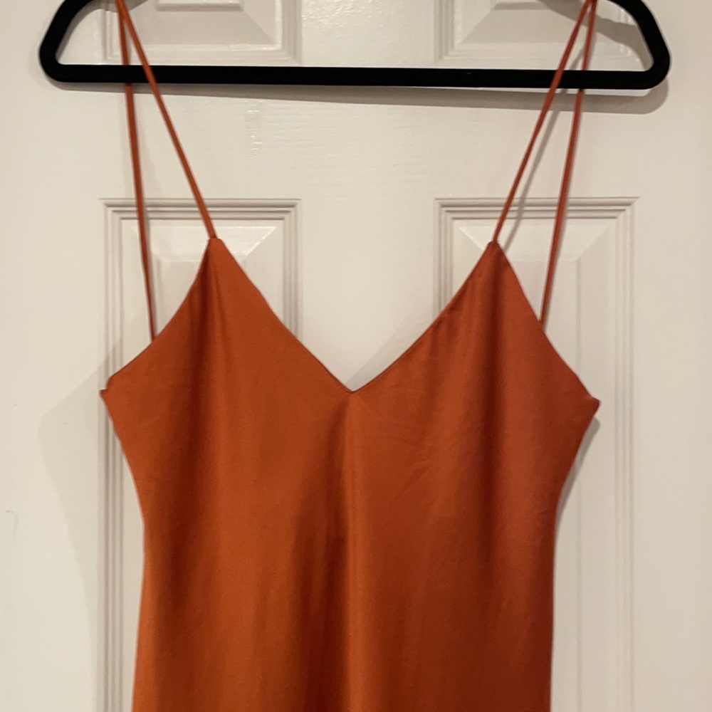 Pretty burnt orange silky spaghetti strap dress with two side slits going up leg - Picture 2 of 9